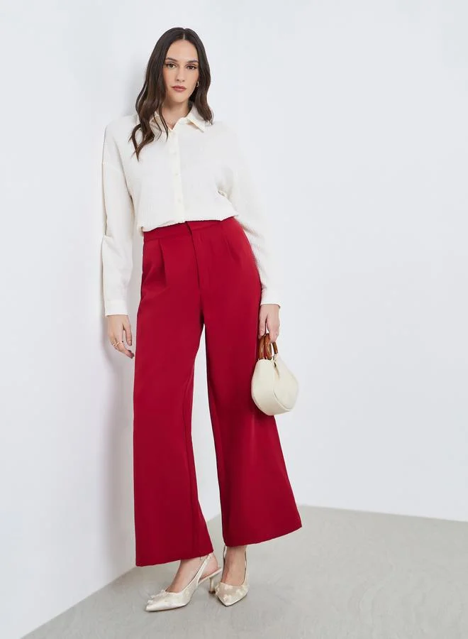 Styli Women Burgundy Wide Leg Trousers